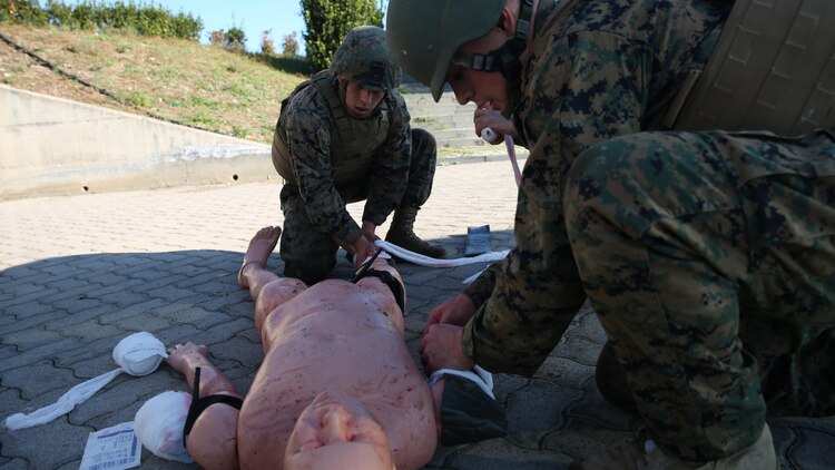Nearly 30 Marines participate in a Tactical Combat Casualty Care course to learn how to save lives in combat situations, Dec. 14-18, 2015, on Naval Air Station Sigonella, Italy. Medical officers and corpsmen with Special-Purpose Marine Air-Ground Task Force Crisis Response-Africa taught the Marines how to apply emergency medical services to injured service members in the event a corpsman is injured or not near a casualty.The Marines and sailors are deployed to NAS Sigonella, Italy, with Special-Purpose Marine Air-Ground Task Force Crisis Response-Africa.