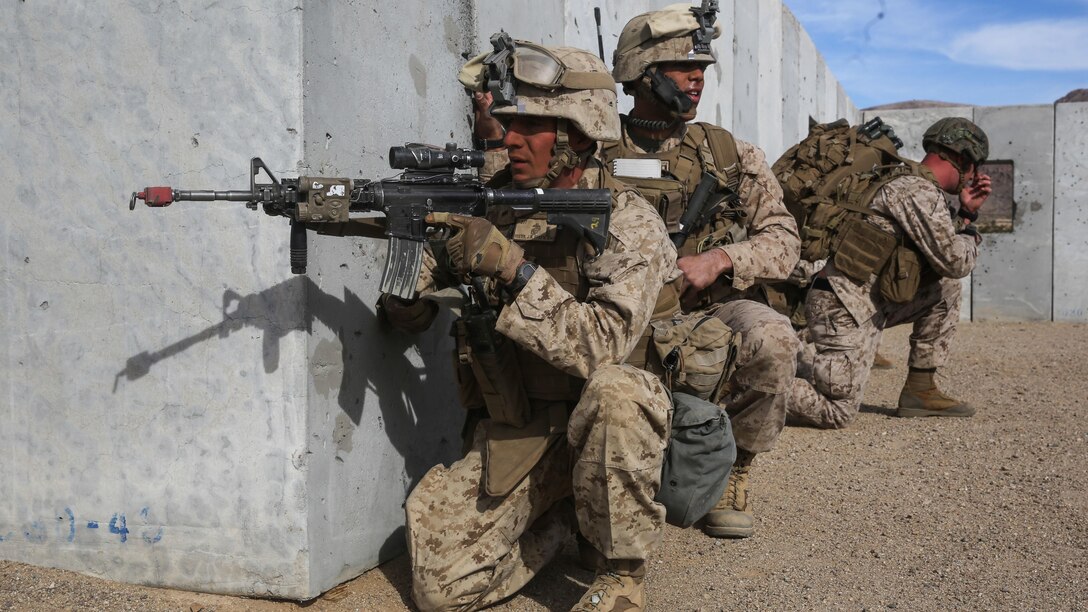 1st Lt. Joshua Foster provides security for his team during the Tactical Recovery of Aircraft and Personnel portion of the Marine Corps Combat Readiness Evaluation at Marine Corps Air Ground Combat Center Twentynine Palms, Calif., Dec. 3, 2015. TRAP’s placement in a MCCRE is meant to evaluate Marines on this mission set which is performed for the specific purpose of the recovery of personnel, equipment, and/or aircraft by the insertion of a TRAP force. 1st Lt. Foster is a platoon commander with 2nd Battalion, 7th Marine Regiment, 1st Marine Division. 