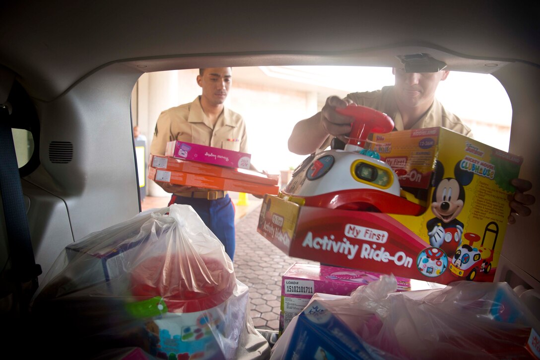 Onward Beach Resort donates toys during the 2015 Toys for Tots toy drive.