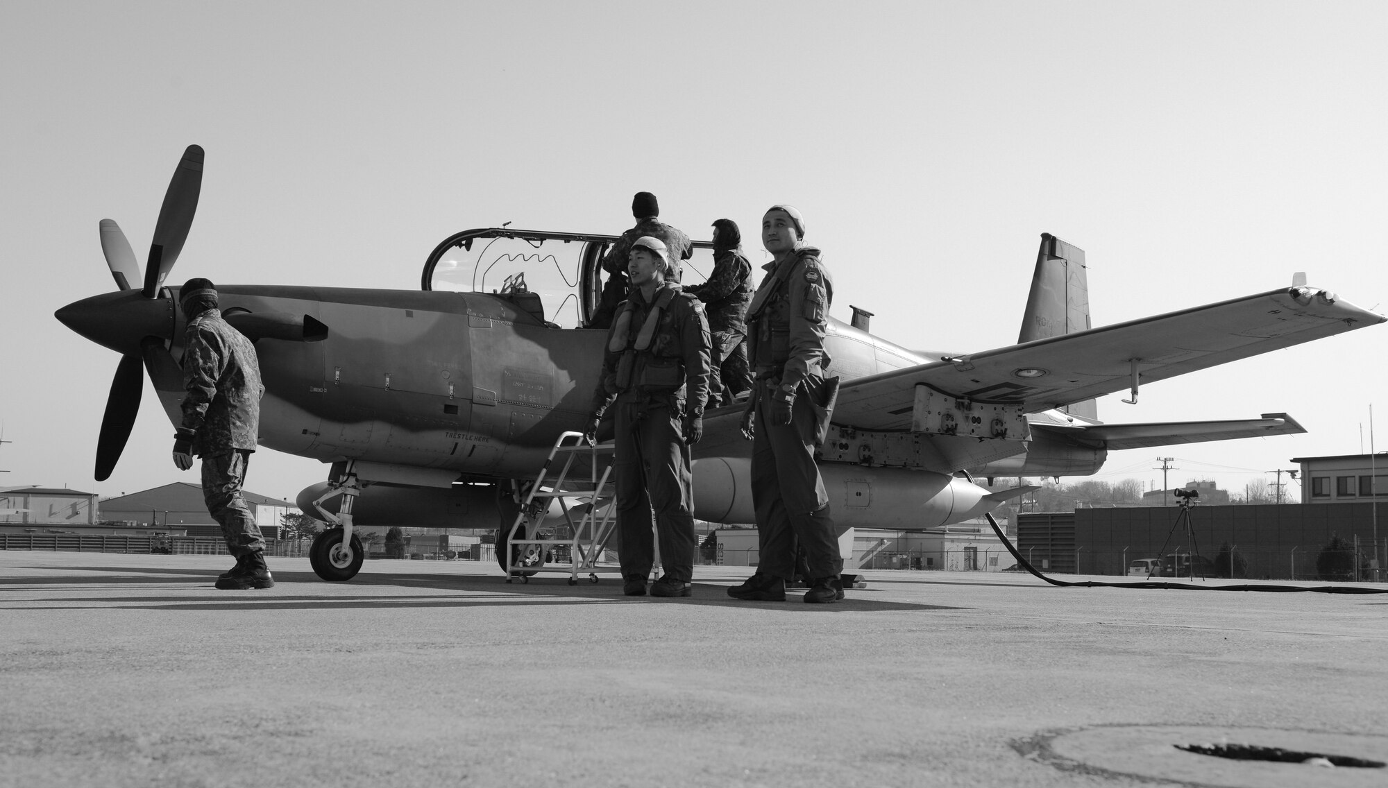 Republic of Korea air force pilots and maintainers prepare a KA-10 Woongbi for a flight during Buddy Wing 15-8 at Osan Air Base, ROK, Dec. 17, 2015. The purpose of the Buddy Wing program is to execute joint tactics, exchange ideas and improve interoperability between U.S. Air Force and ROKAF pilots maintainers and support personnel. (U.S. Air Force photo/Airman 1st Class Dillian Bamman)