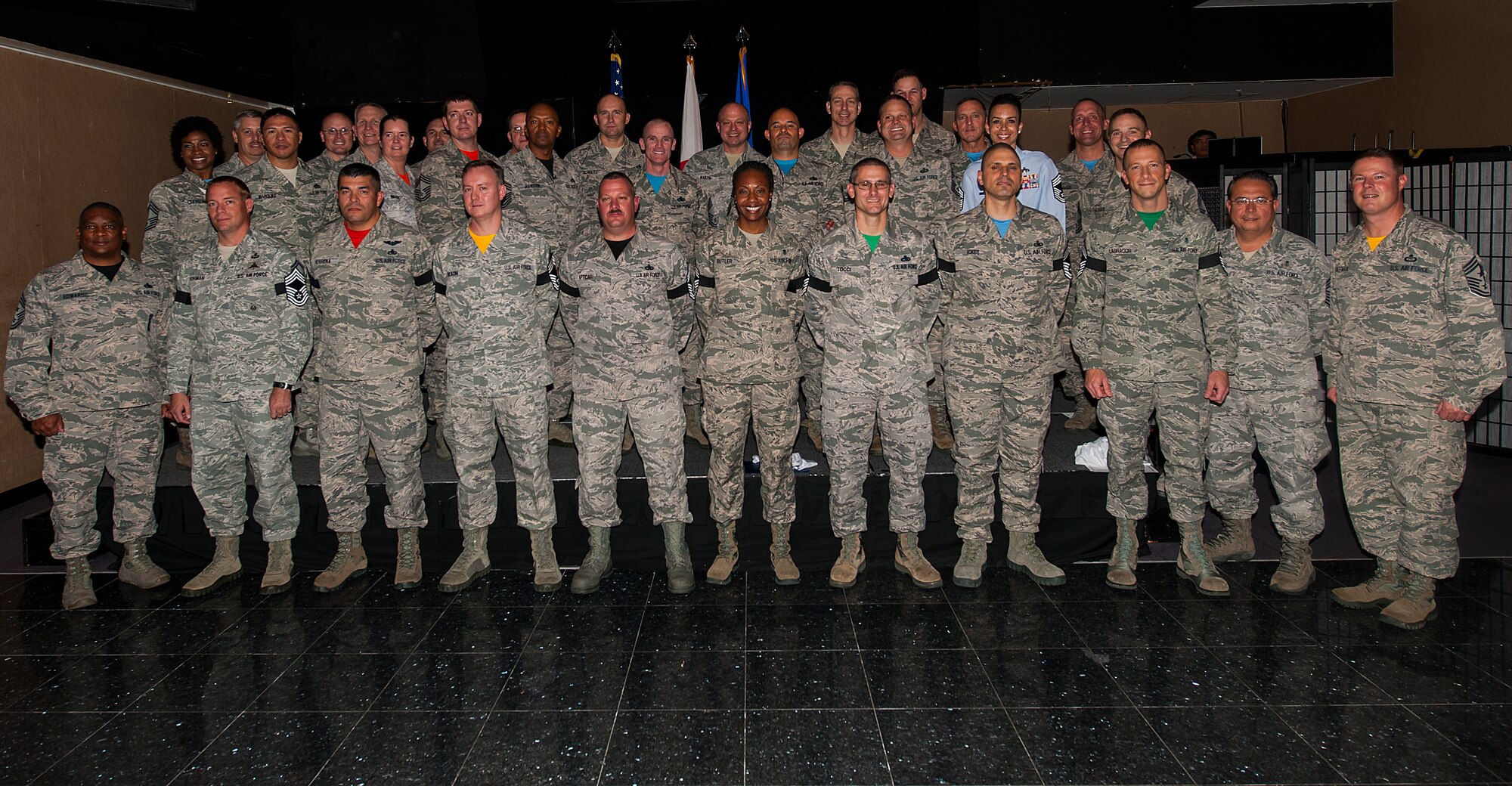 Chief master sergeants from Kadena Air Base, Japan, congratulate the promotion of eight senior master sergeants to the rank of chief master sergeant during the Chief’s Induction Ceremony Dec. 18, 2015. Only one percent of Airmen make the rank of chief master sergeant. (U.S. Air Force photo by Airman 1st Class Corey M. Pettis)