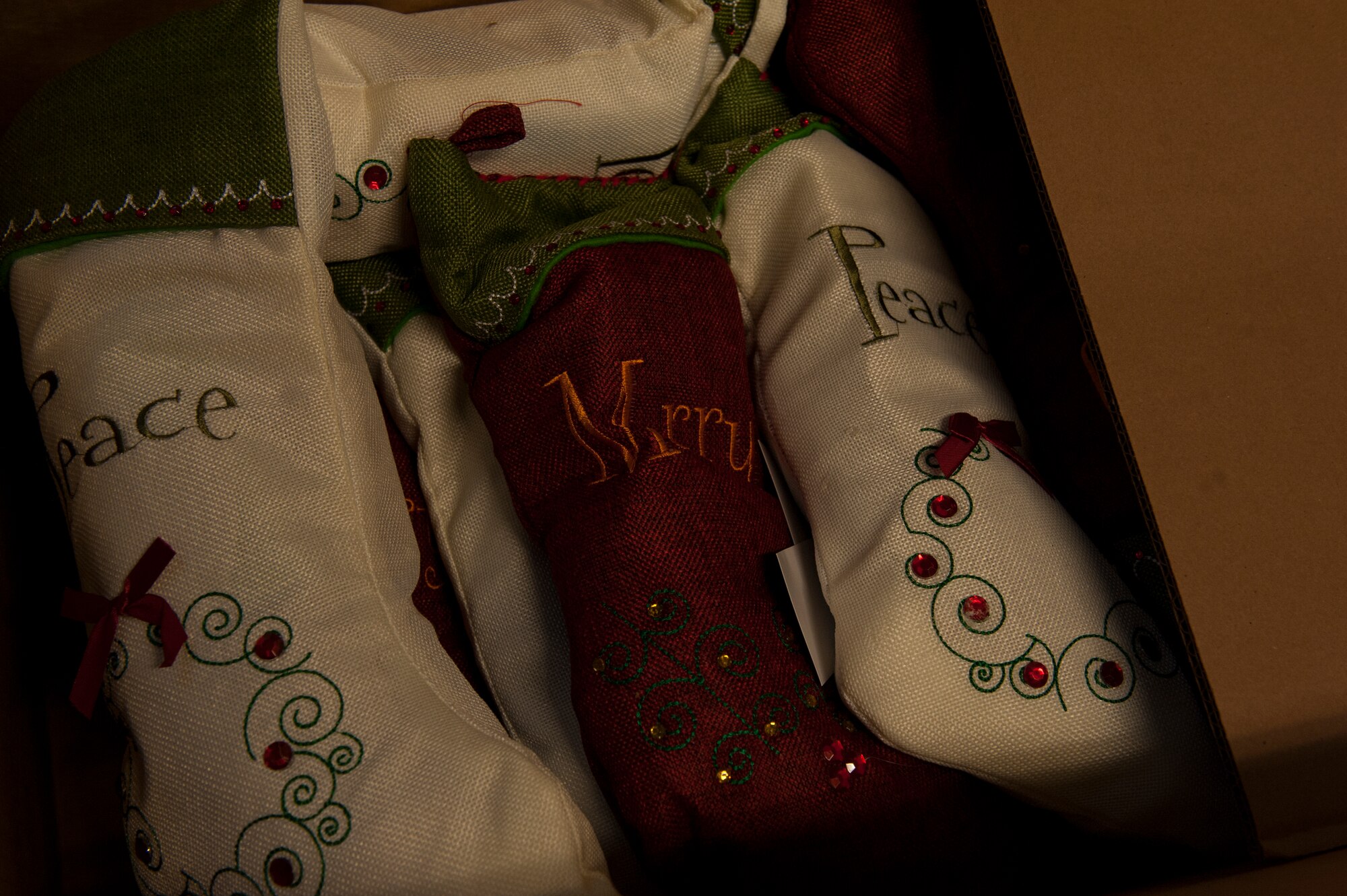 A box full of stockings is ready to be distributed to Kadena’s members Dec. 17, 2015, at Kadena Air Base, Japan. Boatsie’s Boxes Inc. prepared stockings for troops that are overseas for the holiday season. Families and organizations from all over the United States assisted with preparing the stockings. (U.S. Air Force photo by Airman 1st Class Lynette M. Rolen)