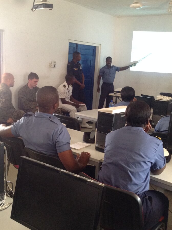 U.S. service members recently completed the second module of Tactical Intelligence Support to Maritime Operations course for the Ghanaian Navy and Maritime Police Force, Dec. 7-18, at Ghana’s Eastern Naval Command Headquarters here. This course has already paid dividends, according to Foster Kotoku, the Ghanaian Maritime Police Force assistant superintendent. During the two-week course, students from the Ghanaian Maritime Police Force seized an undisclosed amount of illicit drugs from a smuggler on a ferry. With follow-on questioning, the police forces were led to a higher connection in the drug trade. (Official U.S. Marine Corps photo by Capt. Jeremy Phillips)