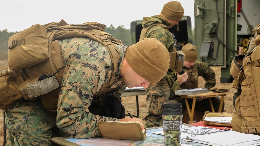 First Lt. Chris Christeson, a platoon commander with 1st Battalion, 10th Marine Regiment, plans for the next fire mission during a limited objective experiment at Marine Corps Base Camp Lejeune, N.C., Dec. 8, 2015. The unit partnered with the Marine Corps Warfighting Laboratory and 3rd Battalion, 6th Marine Regiment, to test direct fire missions from an artillery platoon while supporting an infantry company landing team. 