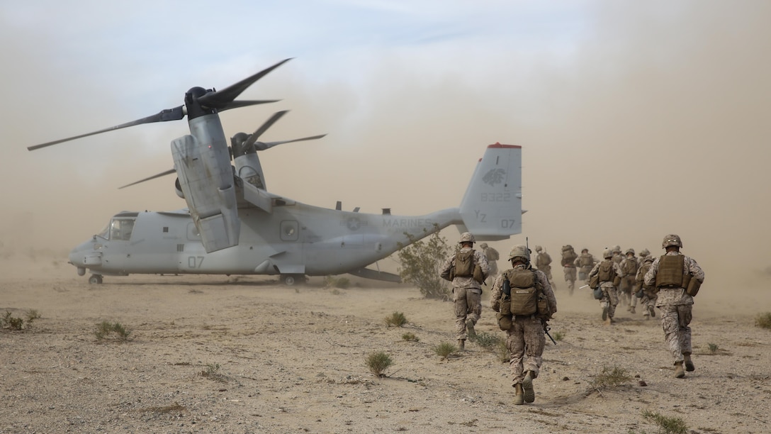Marines set up a perimeter around an MV-22B Osprey tiltrotor aircraft during a Tactical Recovery of Aircraft and Personnel mission as part of a Marine Corps Combat Readiness Evaluation at Marine Corps Air Ground Combat Center Twentynine Palms, California, Dec. 3, 2015. TRAP’s placement in a MCCRE is meant to evaluate Marines on this mission set which is performed for the specific purpose of the recovery of personnel, equipment, and/or aircraft by the insertion of a TRAP force. The Marines are with 2nd Battalion, 7th Marine Regiment, 1st Marine Division.