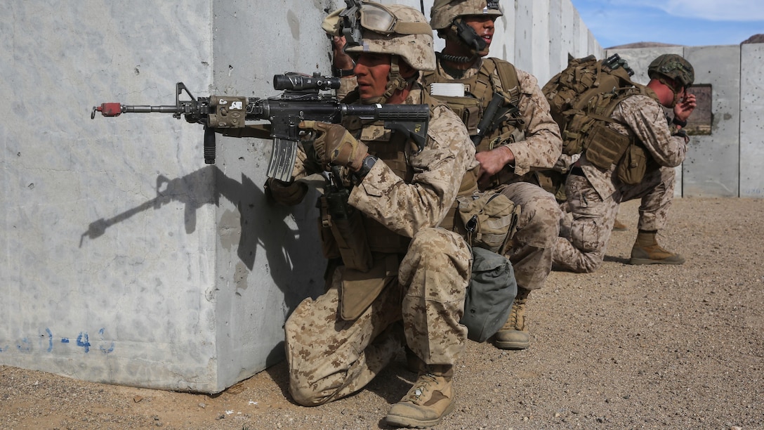 1st Lt. Joshua Foster provides security for his team during the Tactical Recovery of Aircraft and Personnel portion of the Marine Corps Combat Readiness Evaluation at Marine Corps Air Ground Combat Center Twentynine Palms, California, Dec. 3, 2015. TRAP’s placement in a MCCRE is meant to evaluate Marines on this mission set which is performed for the specific purpose of the recovery of personnel, equipment, and/or aircraft by the insertion of a TRAP force. 1st Lt. Foster is a platoon commander with 2nd Battalion, 7th Marine Regiment, 1st Marine Division