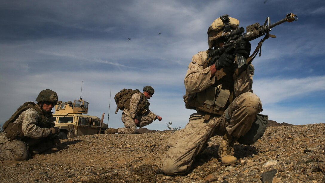 Lance Cpl. Alex Chagaris sights in on the location of an unmanned aerial vehicle to be recovered during the Tactical Recovery of Aircraft and Personnel portion of a Marine Corps Combat Readiness Evaluation at Marine Corps Air Ground Combat Center Twentynine Palms, California, Dec. 3, 2015. TRAP’s placement in a MCCRE is meant to evaluate Marines on this mission set which is performed for the specific purpose of the recovery of personnel, equipment, and/or aircraft by the insertion of a TRAP force. Lance Cpl. Chagaris is a Santa Monica native and a team leader with Company F, 2nd Battalion, 7th Marine Regiment, 1st Marine Division.