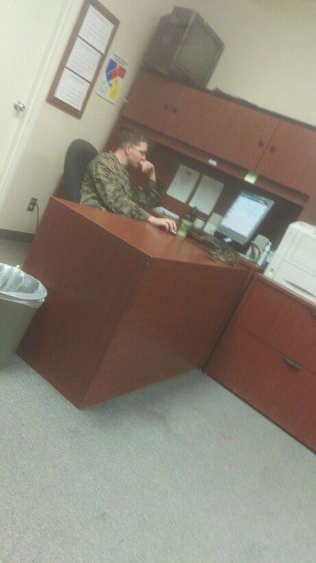 LCpl Andrew M. Petricek learns how to process Vehicle Requests. MCCES S-4 conducts All transport needs for all of MCCES.
