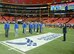 A mass enlistment was held on the field just before kickoff as 12 of the newest Air Force Reservists joined the ranks at the Air Force Reserve Celebration Bowl. The enlistment was conducted by Maj Gen Stayce D. Harris, 22nd Air Force commander, Dobbins Air Reserve Base. (Air Force photo/Master Sgt. Chance Babin)