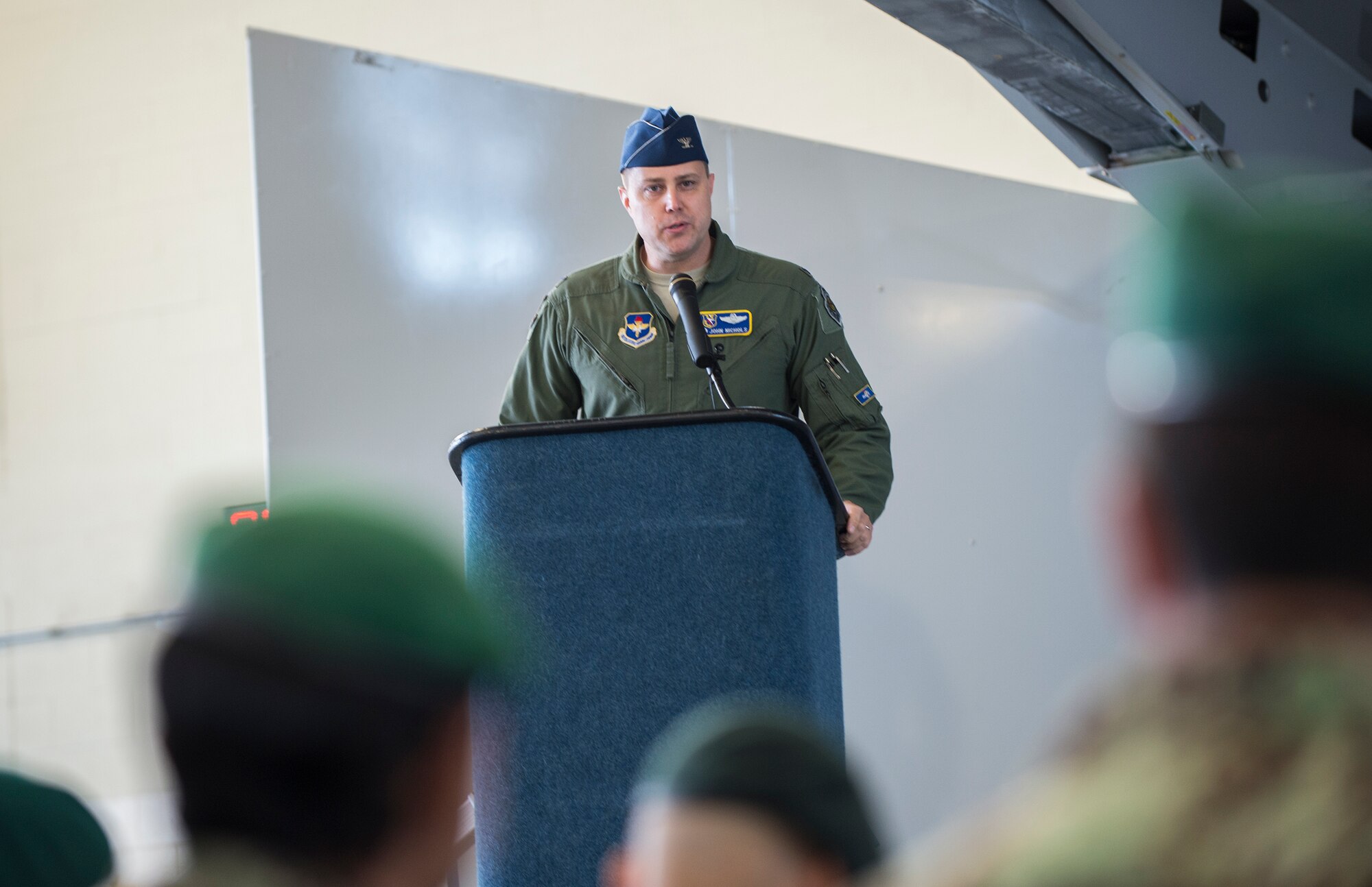 Col. John Nichols, the 14th Flying Training Wing commander, speaks during the graduation of the first 81st Fighter Squadron’s student pilot class Dec. 18, 2015, at Moody Air Force Base, Ga. The Afghan air force pilots began their classroom training in February 2015 and launched on their first A-29 Super Tucano training sorties in March 2015. (U.S. Air Force photo/Senior Airman Ceaira Tinsley)