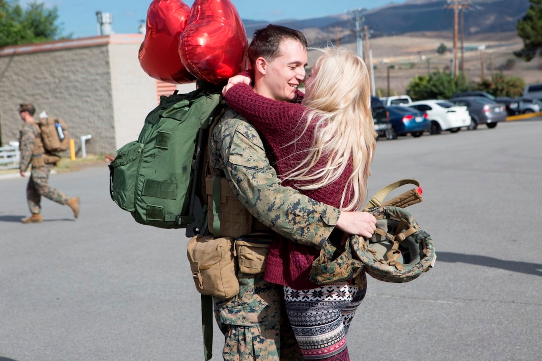 Cpl. Dominique A. Sparacino is welcomed home by his loving wife, Victoria Sparacino, upon return from a seven-month deployment with the 15th Marine Expeditionary Unit at Marine Corps Base Camp Pendleton, California. While deployed, the 15th MEU participated in more than 15 different theater security cooperation or bi-lateral exercises including combined arms and desert survival training with French forces in Djibouti, the Malaysia-US Amphibious Exercise, Combined Afloat Readiness and Training in Brunei, and more than 12 subject matter expert exchanges with partner nations throughout the Middle East. Sparacino is an infantryman with Lima Company, 3rd Battalion, 1st Marine Regiment, 1st Marine Division, I Marine Expeditionary Force. (Marine Corps photo by Cpl. April L. Price/ Released)