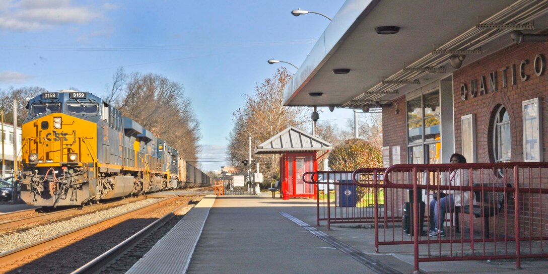 Military police and civilian law enforcement officers with Security Battalion, Marine Corps Base Quantico, check the identification of people who enter the base from the Virginia Railway Express station in the Town of Quantico. Security Battalion Marines routinely conduct random ID checks on people who ride the VRE trains and access the base through the Town of Quantico. In an effort to increase the security of the base and the safety of the people who work aboard the base, Security Battalion Marines maintain increased awareness at base access points.