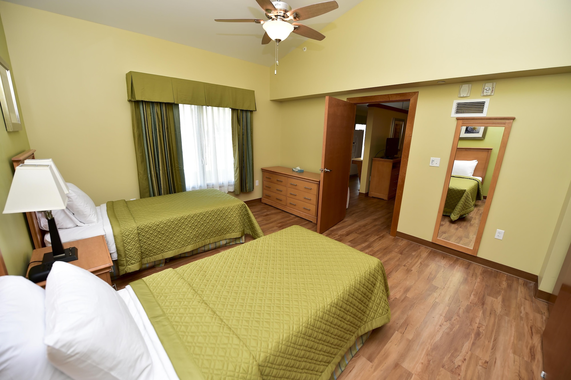 The new two bedroom temporary lodging facility (TLF), which began construction in June 2014, had its grand opening ribbon cutting ceremony at Hurlburt Field, Fla., Dec. 18 2015. The new TLF offers eight two bedroom units to provide space for larger families transitioning to and from Hurlburt Field. (U.S. Air Force photo by Senior Airman Jeff Parkinson)