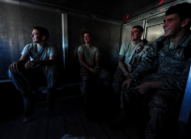 Crew chiefs with the 1st Special Operations Aircraft Maintenance Squadron head out to their assigned aircraft to perform maintenance at Hurlburt Field, Fla., Dec. 15, 2015. Crew chiefs with the 4th Aircraft Maintenance Unit are trained to diagnose malfunctions on the AC-130U Spooky Gunship during pre-flight and post-flight inspections, repair and refuel the aircraft, keep detailed records, marshal aircraft, to remain mission ready at all times. (U.S. Air Force photo by Senior Airman Meagan Schutter)