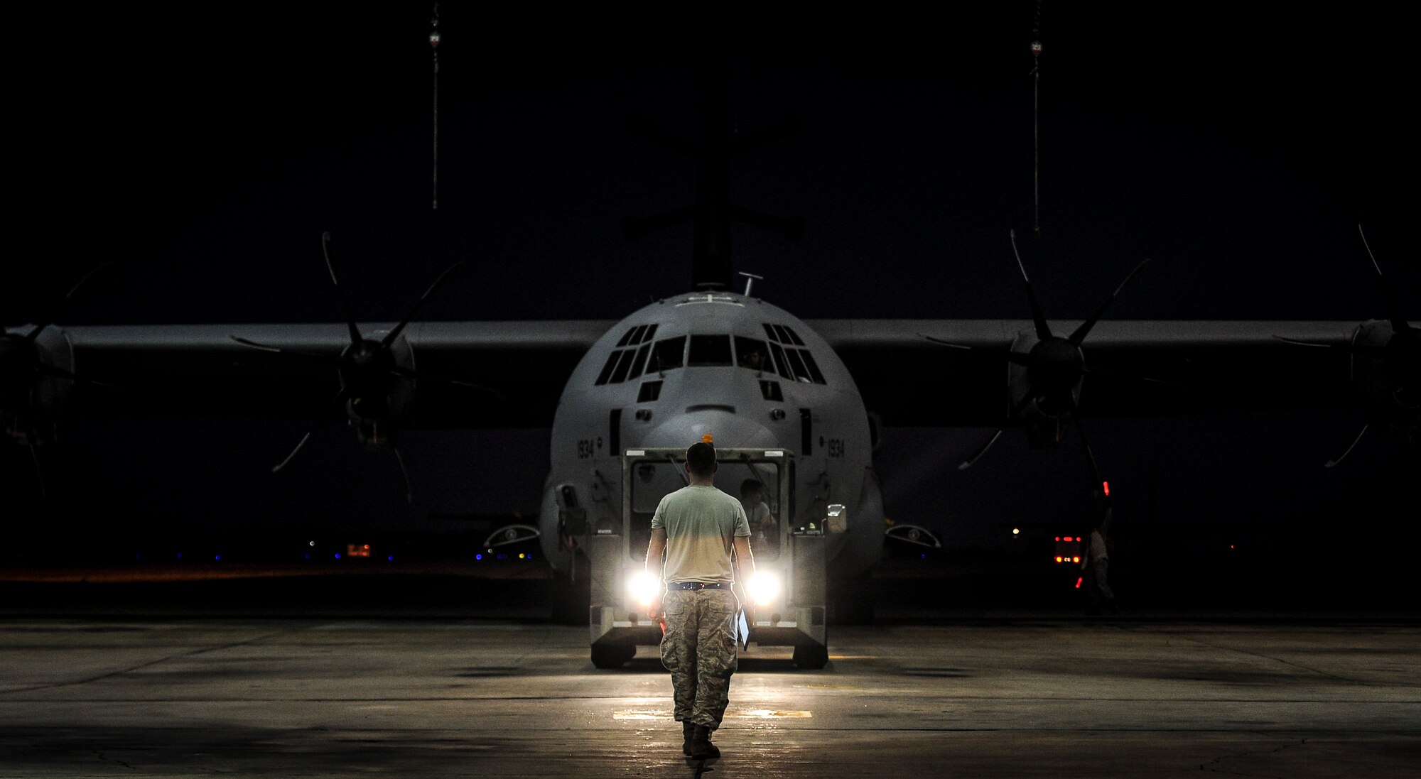 An EC-130J Commando Solo III is towed to the wash rack on the flightline to be cleaned at Hurlburt Field, Fla., Dec. 15, 2015. The EC-130J is a specially modified, four-engine Hercules transport aircraft that conducts military information support operations (MISO) and civil affairs broadcasts through radio signals and military communications bands. (U.S. Air Force photo by Senior Airman Meagan Schutter)