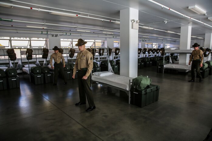 Drill instructors of India Company, 3rd Recruit Training Battalion, begin the transformation of their new recruits during pick up at Marine Corps Recruit Depot San Diego, Dec. 18. From this day forward, these drill instructors will be with their recruits every day and everywhere they go until graduation day. Annually, more than 17,000 males recruited from the Western Recruiting Region are trained at MCRD San Diego. India Company is scheduled to graduate March 11.