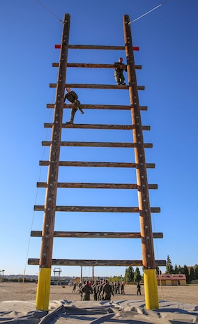 Recruits of Bravo Company, 1st Recruit Training Battalion, participate in the Stairway to Heaven obstacle during Confidence Course II at Marine Corps Recruit Depot San Diego, Dec. 15. Many of the obstacles test the recruits’ confidence and mental strength in overcoming the challenges before them. Today, all males recruited west of the Mississippi are trained at MCRD San Diego. The depot is responsible for training more than 16,000 recruits annually. Bravo Company is scheduled to graduate Feb. 12.