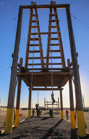 Recruits of Bravo Company, 1st Recruit Training Battalion, participate in Confidence Course II at Marine Corps Recruit Depot San Diego, Dec. 15. Obstacles in the course included the Monkey Bridge, Skyscraper, Wall Climb and several others. Today, all males recruited west of the Mississippi are trained at MCRD San Diego. The depot is responsible for training more than 16,000 recruits annually. Bravo Company is scheduled to graduate Feb. 12.
