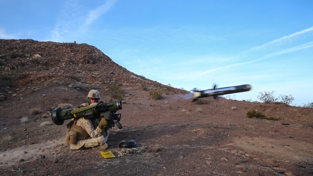 Marines fire an FGM-148 Javelin anti-tank missile during the company supported, live-fire assault portion of a Marine Corps Combat Readiness Exercise at Marine Corps Air Ground Combat Center Twentynine Palms, Calif., Dec. 7, 2015. The purpose of a MCCRE is to evaluate Marines’ collective performance in specific mission requirements that will prepare them for their upcoming deployment rotation. The Marines are with 2nd Battalion, 7th Marine Regiment, 1st Marine Division. (U.S. Marine Corps photo by Lance Cpl. Devan K. Gowans)