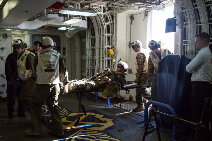 At sea. (Dec. 15, 2015) -U.S Marines with the 13th Marine Expeditionary Unit (MEU), carry an injured Marine while conducting a simulated casualty evacuation as part of an ongoing amphibious assault during certification exercise (CERTEX), at sea, Dec. 15, 2015.  CERTEX is the final evaluation of the 13th MEU prior to deployment and is intended to certify their readiness to conduct missions across the full spectrum of military operations. (U.S Marine Corps photo by Cpl. Briauna Birl/RELEASED)