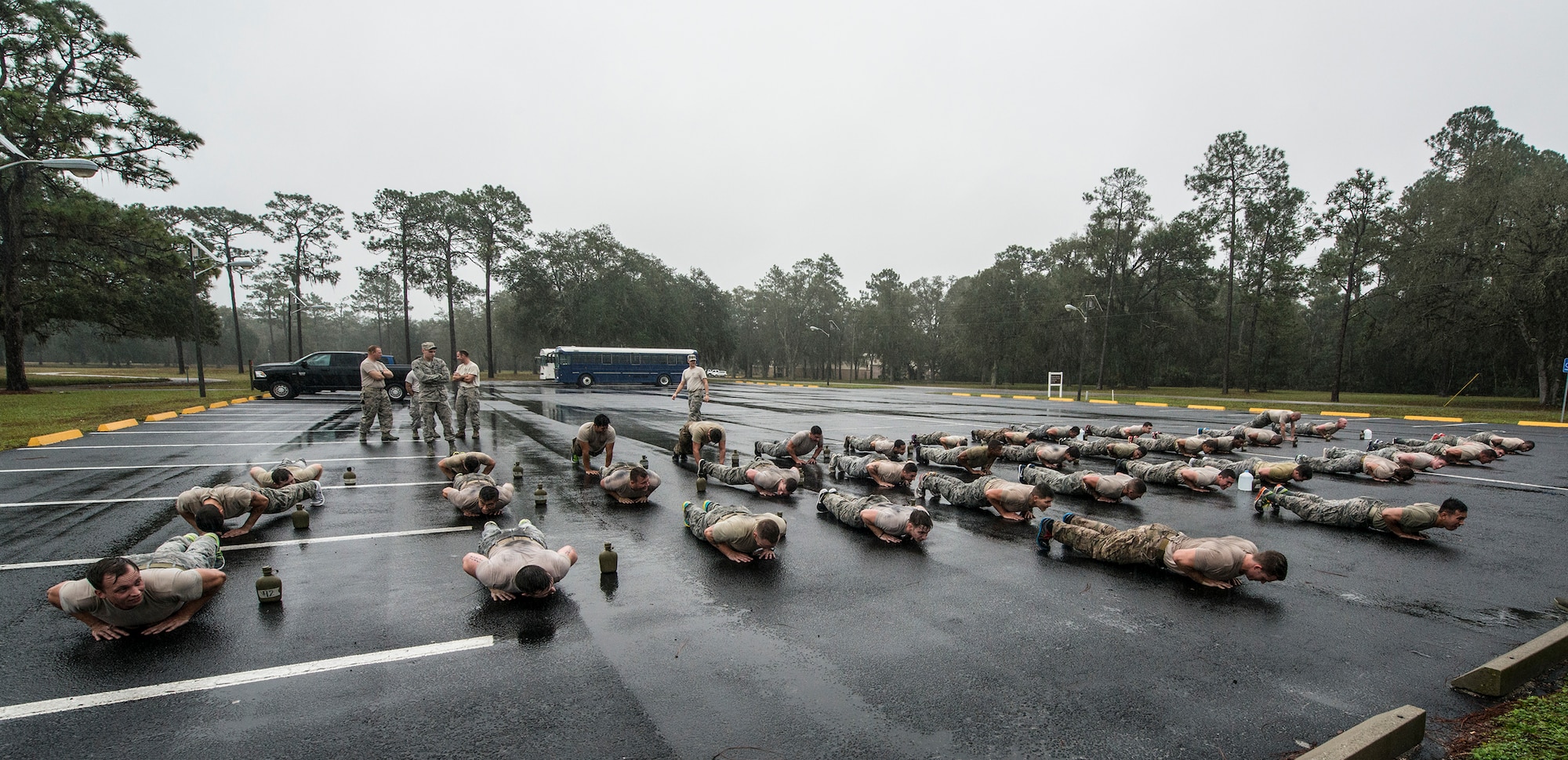 Airmen from the 820th Base Defense Group at Moody Air Force Base, Ga., and the 1st Special Operations Security Forces Squadron at Hurlburt Field, Fla., participate in remedial physical training, Dec. 15, 2015, at Camp Blanding, Fla. The training was used to push Airmen to their limits during a qualification assessment for Army Air Assault School. (U.S. Air Force photo by Airman 1st Class Lauren M. Johnson/Released)