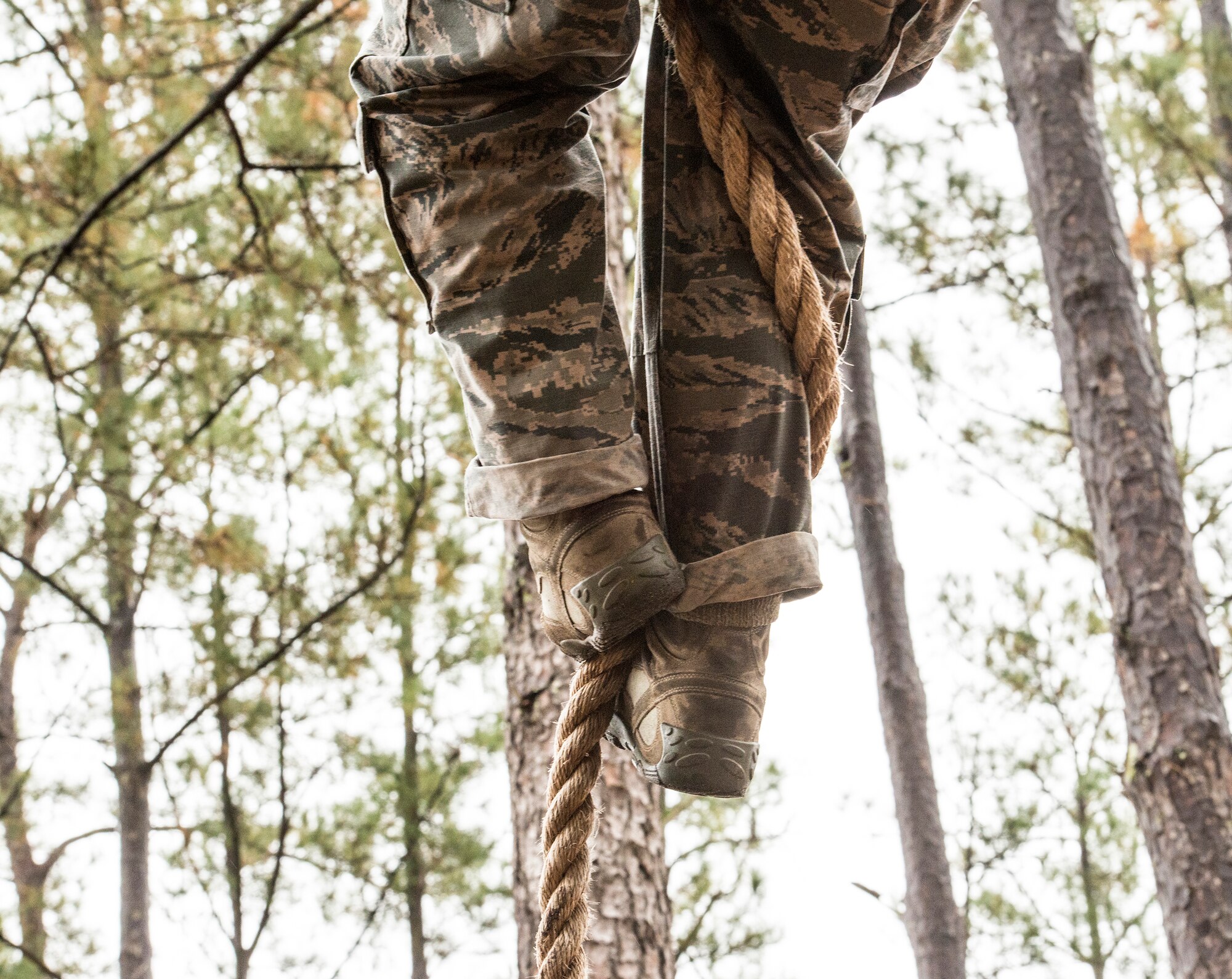 An Airman from the 820th Base Defense Group at Moody Air Force Base, Ga., demonstrates an S-lock during an air assault assessment, Dec. 15, 2015, at Camp Blanding, Fla. Climbers use an S-lock to secure themselves in order to prevent from sliding to the bottom. (U.S. Air Force photo by Airman 1st Class Lauren M. Johnson/Released)