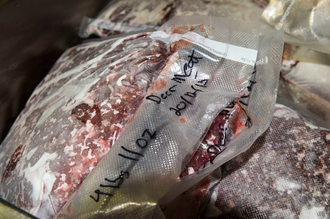 Basic Course students assigned to the 333rd Fighter Squadron, class 15-DBE, donate 65 pounds of frozen venison, Dec. 21, 2015, to the Community Soup Kitchen of Goldsboro, North Carolina.  The class volunteered their weekend to process, package and deliver three locally-harvested deer to help feed local families in need. (U.S. Air Force photo/Senior Airman Aaron J. Jenne)