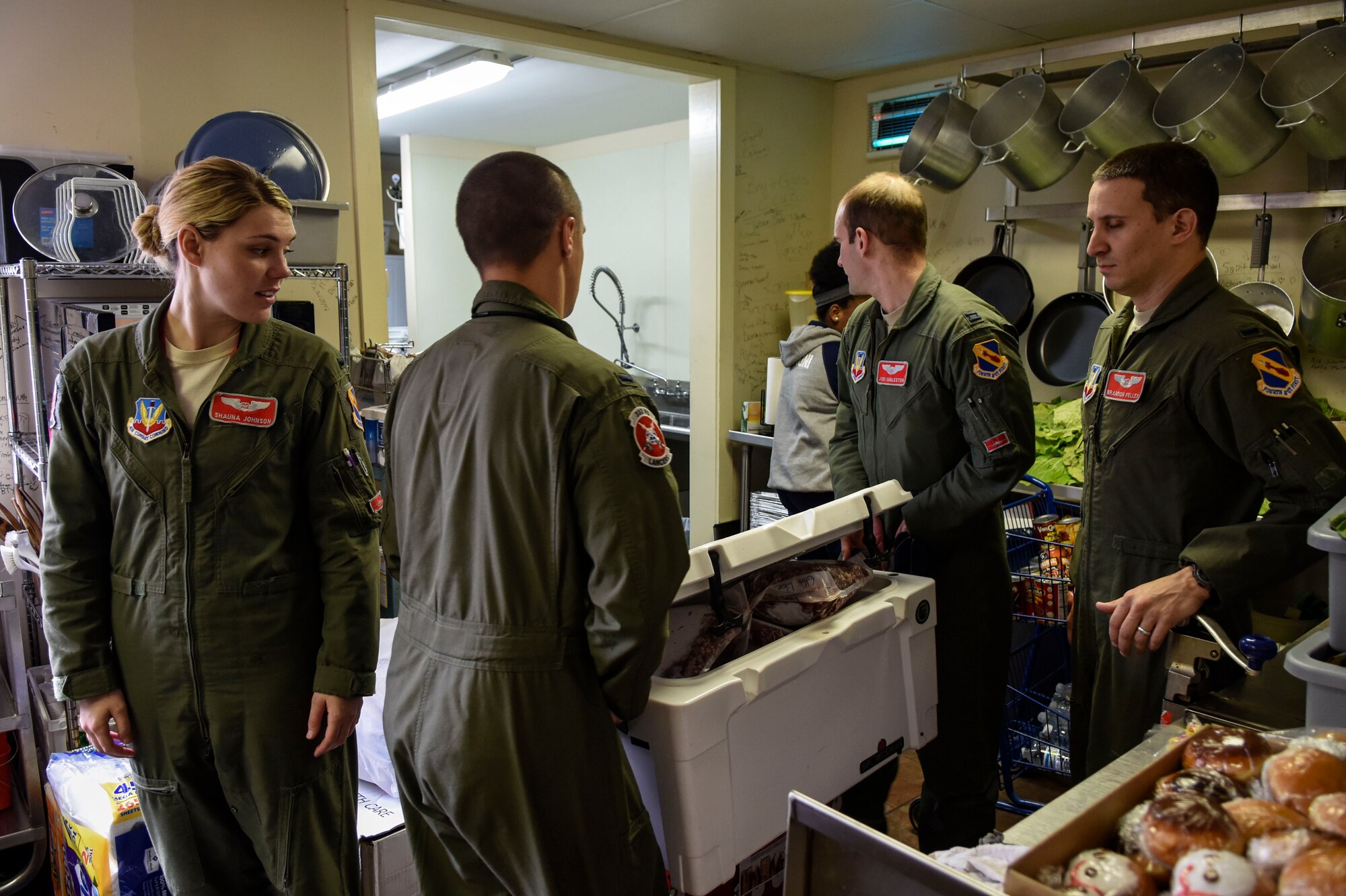 Basic Course students assigned to the 333rd Fighter Squadron, class 15-DBE, deliver venison, Dec. 21, 2015, at the Community Soup Kitchen of Goldsboro, North Carolina. The class volunteered their weekend to process, package and deliver three locally-harvested deer to donate to the soup kitchen. (U.S. Air Force photo/Senior Airman Aaron J. Jenne)