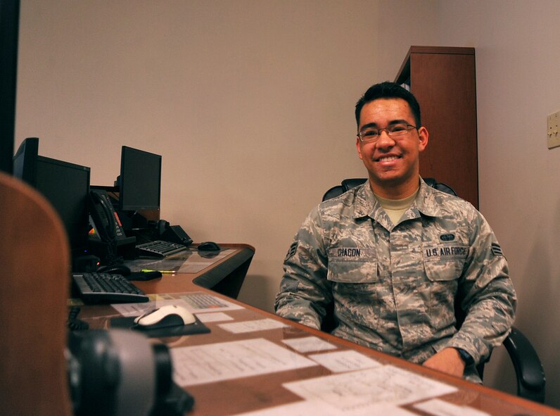 Senior Airman David Chacon, 319th Communications Squadron High Frequency Global Communication System radio technician, helps operate one of two HFGCS sites in the United States at Grand Forks Air Force Base, North Dakota, Dec. 21, 2015. Chacon was selected for Warrior of the Week for the fourth week of December. (U.S. Air Force photo by Senior Airman Bonnie Grantham/Released)