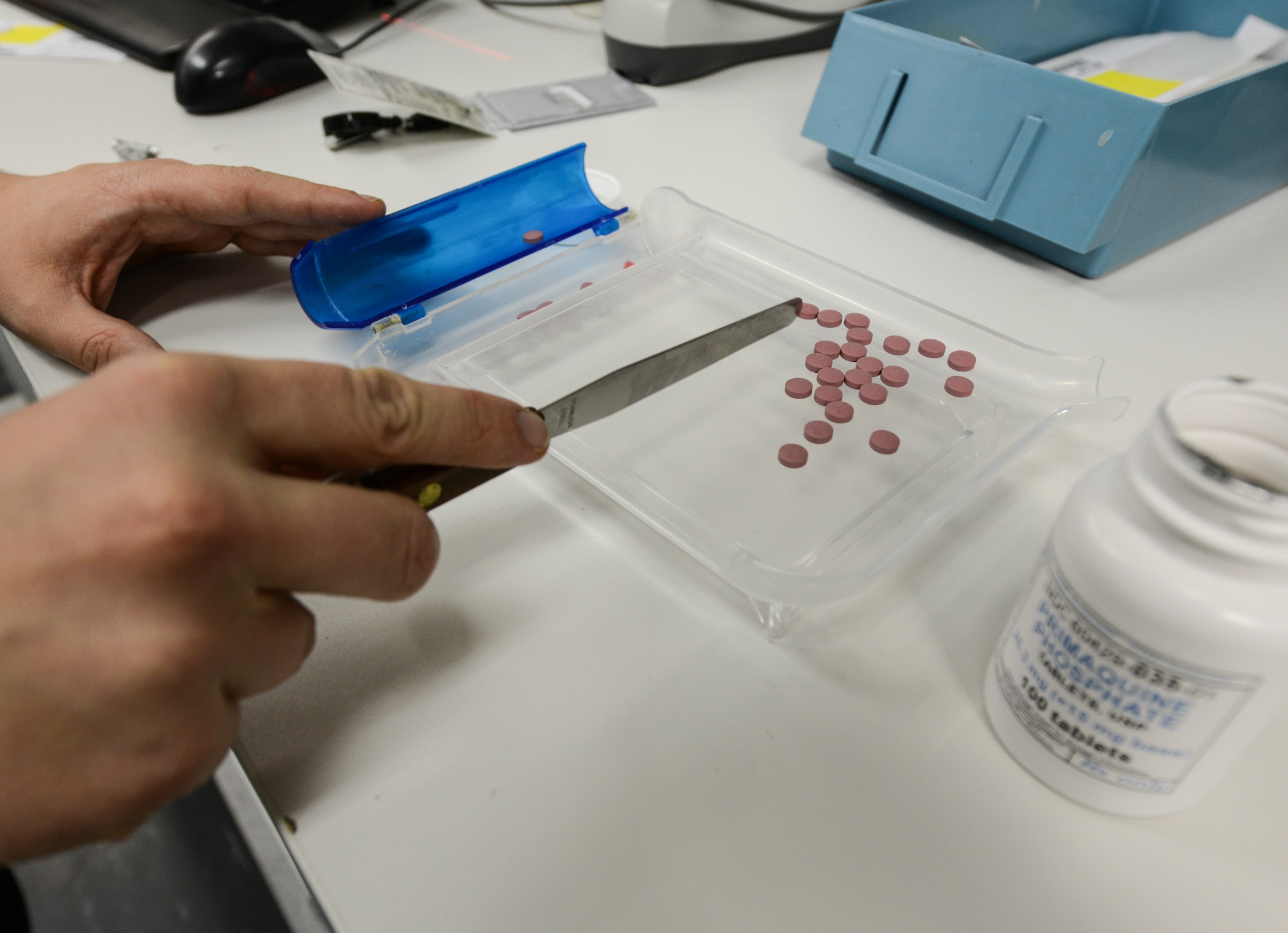A pharmacy technician counts out pills to fill a prescription for a patient at the Ramstein Air Base pharmacy, Dec. 15, 2015. The pharmacy uses a 9-rights policy which helps to verify the patient’s information along with verifying the dose and amount is accurate, ensuring patient safety. (U.S. Air Force photo/Staff Sgt. Leslie Keopka)