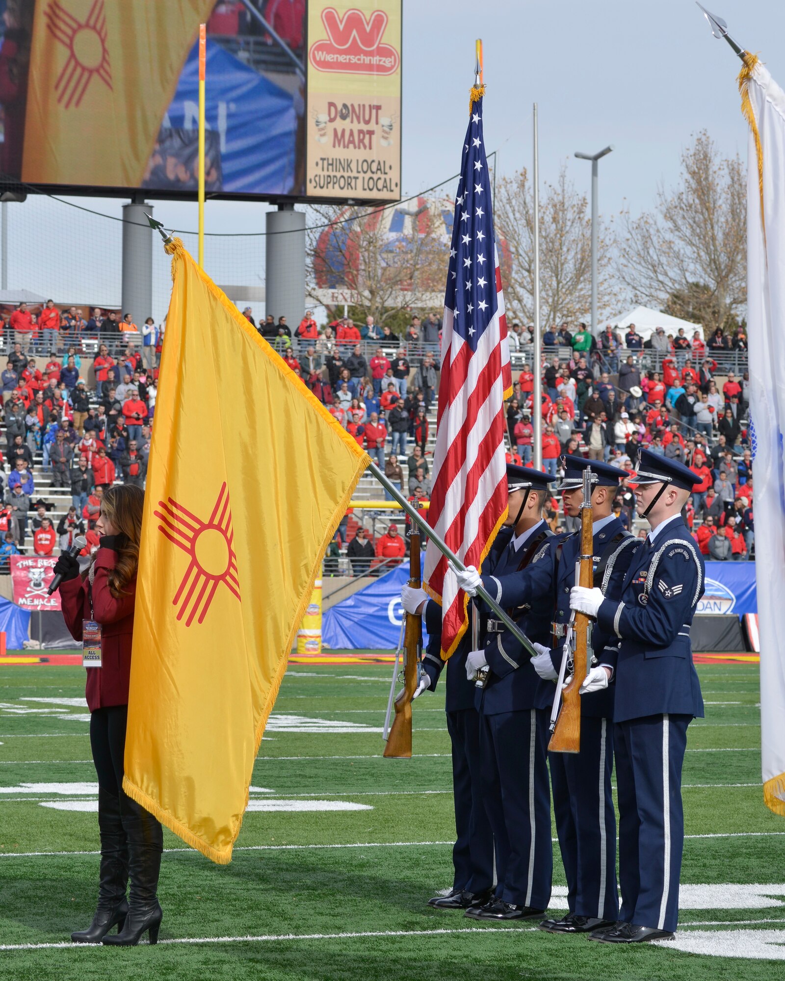 Kirtland Honor Guard presents the colors at the UNM Gildan Bowl Dec. 19. (Photo by Jamie Burnett)