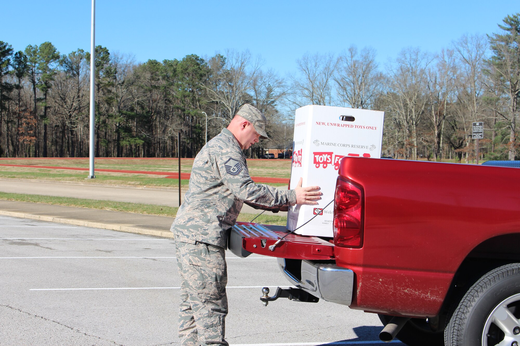 Master Sgt. James Key loads the toys collected as part of the Toys for Tots drive held at AEDC through an effort headed by the Air Force Sergeants Association. Several toys were donated, and on the last day of the drive, Dec. 14, 2015, Key took the donations to the drop-off location at Tullahoma Fire Department. (U.S. Air Force photo/Holly Fowler)