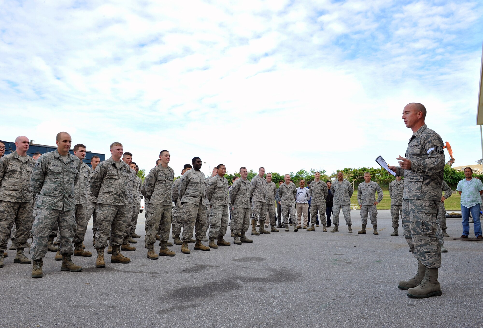 U.S. Air Force Staff Sgt. Joshua Cartwright, 18th Communications Squadron cable and antenna systems supervisor, expresses words of gratitude to members of the 18th CS after receiving a promotion under the Stripes for Exceptional Performers program, Dec. 21, 2015, at Kadena Air Base, Japan. Stripes for Exceptional Performers is a recognition that is reserved for top performers who have demonstrated a strong level of leadership, commitment and professionalism toward their professional duties. (U.S. Air Force photo by Naoto Anazawa)