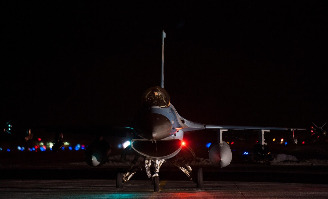 An F-16 Fighting Falcon pilot waits to take off from Eielson Air Force Base, Alaska, Dec. 7, 2015. U.S. Air Force photo by Master Sgt. Joseph Swafford