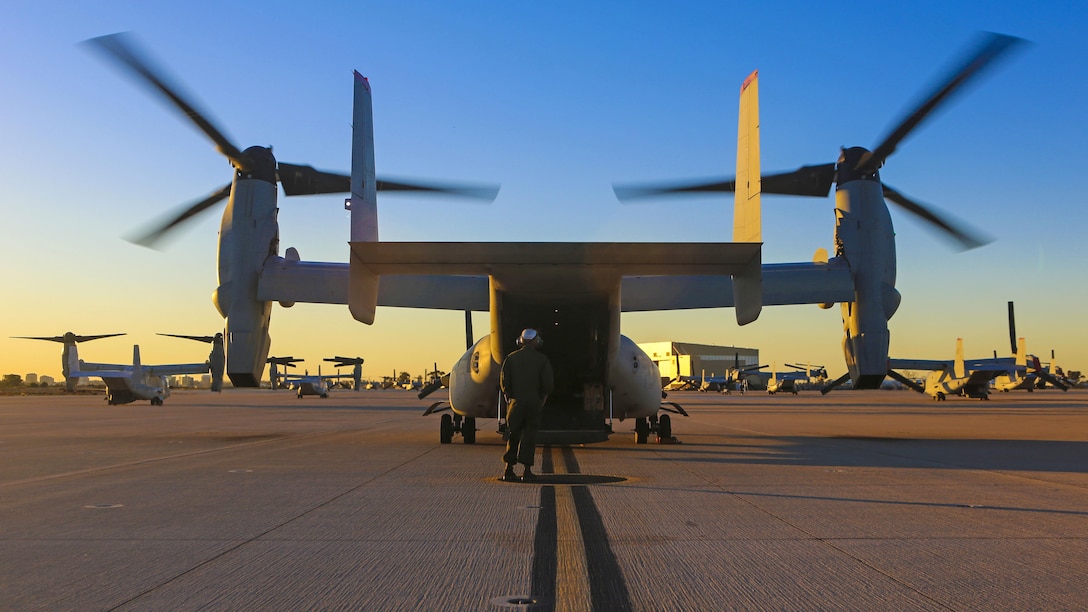 Marines with Marine Medium Tiltrotor Squadron 363 perform post-flight checks on an MV-22B Osprey after an aerial refueling training event at Marine Corps Air Station Miramar, California, Dec. 16. The squadron conducts this annual training once every two months to maintain their proficiency with the maneuvers.