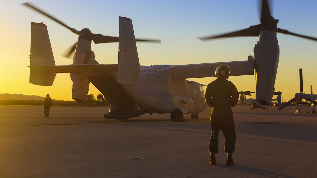 Marines with Marine Medium Tiltrotor Squadron 363 perform post-flight checks on an MV-22B Osprey after an aerial refueling training event at Marine Corps Air Station Miramar, California, Dec. 16. The squadron conducts this annual training once every two months to maintain their proficiency with the maneuvers.