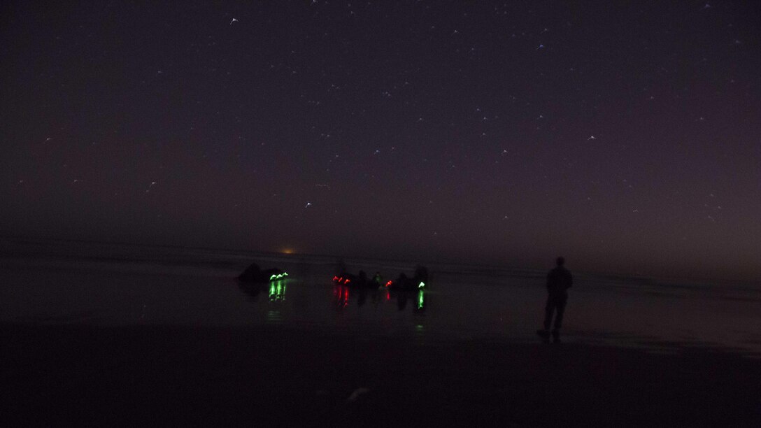 U.S. Marines with 1st Reconnaisance Battalion, 1st Marine Division dismount a zodiac during Steel Knight 2016 at Marine Corps Base Camp Pendleton, California, Dec. 2, 2015. Steel Knight is an annual field training exercise that enables 1st Marine Division to test and refine its command and control capabilities by acting as the headquarters element for a forward-deployed Marine Expeditionary Force.
