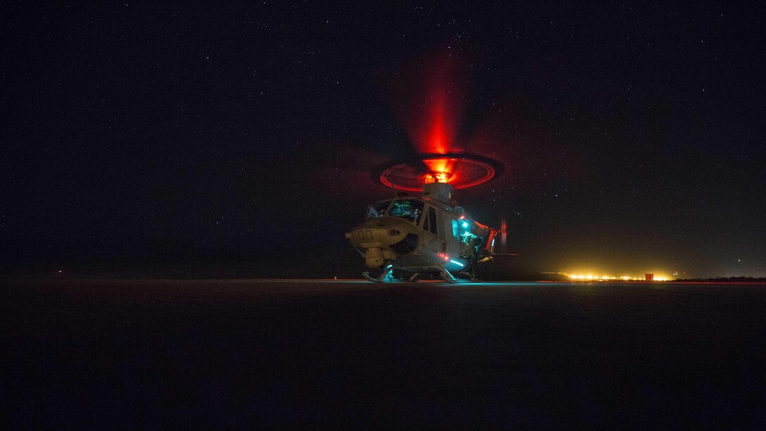 U.S. Marines with 1st Reconnaisance Battalion board a UH-1Y Huey Venom during Steel Knight 16 at Marine Corps Air Ground Combat Center Twentynine Palms, California, Dec. 11, 2015. Steel Knight is an annual field training exercise that enables 1st Marine Division to test and refine its command and control capabilities by acting as the headquarters element for a forward-deployed Marine Expeditionary Force.