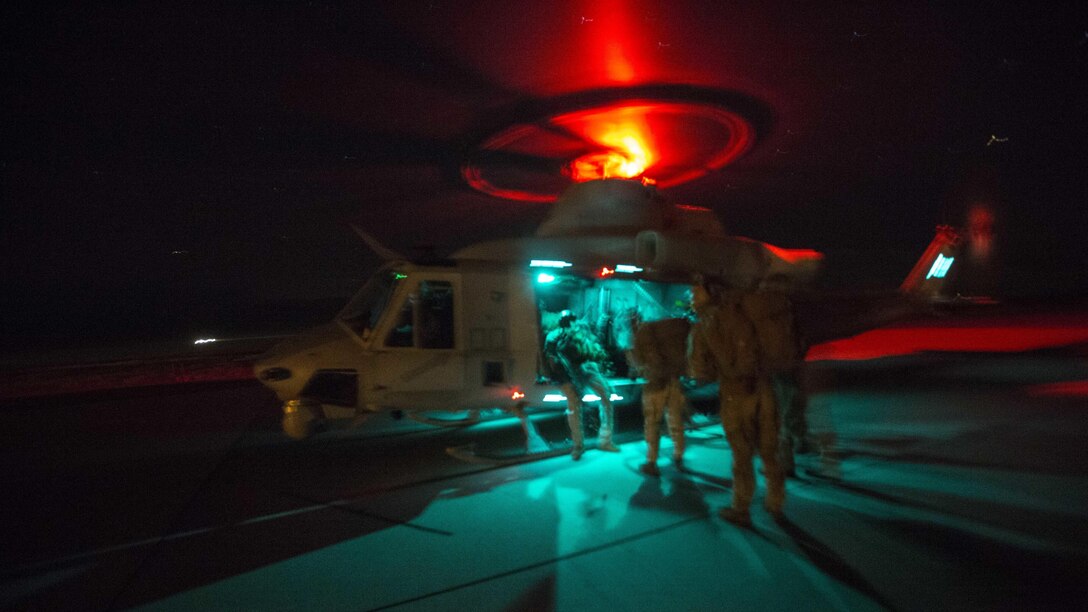 U.S. Marines with 1st Reconnaisance Battalion, 1st Marine Division board a UH-1Y Huey Venom during Steel Knight 16 at Marine Corps Air Ground Combat Center Twentynine Palms, California, Dec. 11, 2015. Steel Knight is an annual field training exercise that enables 1st Marine Division to test and refine its command and control capabilities by acting as the headquarters element for a forward-deployed Marine Expeditionary Force.