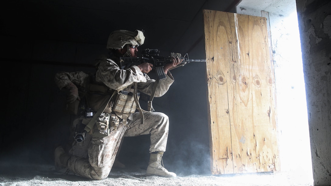 A Marine provides suppressing fire during the mechanized assault portion of a Marine Corps Combat Readiness Exercise at Marine Corps Air Ground Combat Center Twentynine Palms, Calif., Dec. 3, 2015. The purpose of a MCCRE is to evaluate Marines’ collective performance in specific mission requirements that will prepare them for their upcoming deployment rotation. The Marine is with 2nd Battalion, 7th Marine Regiment, 1st Marine Division. 