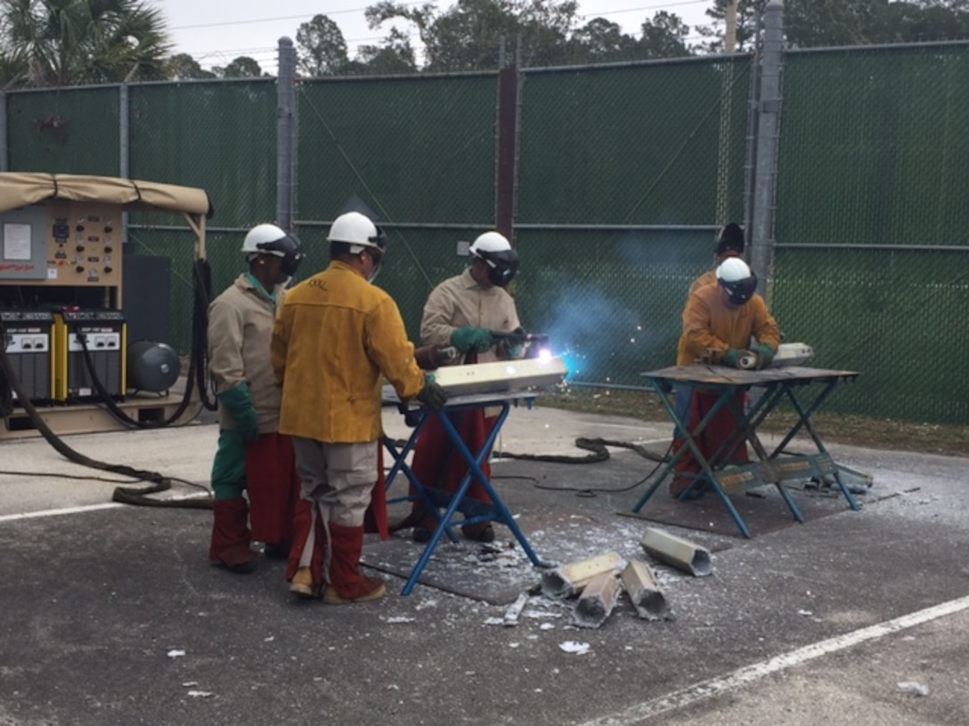 Plasma cutting is taught to Disposition Services Unit Six sailors in a safe and controlled environment.