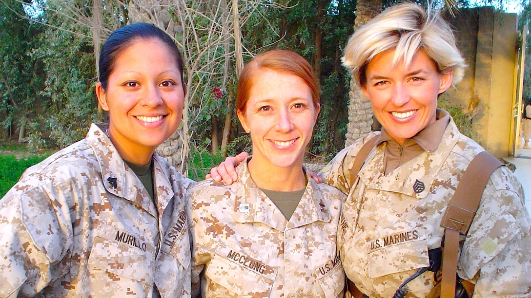 Lynn Kinney (left), Megan McClung (center) and Amy Forsythe(right) served together during their deployment to Camp Fallujah, Iraq in 2006. They were assigned to the Camp Pendleton-based I Marine Expeditionary Force (Forward) Public Affairs Office. This photo was taken at Camp Fallujah in April 2006. McClung was killed by an IED in Ramadi, Iraq, Dec. 6, 2006. Kinney, now a staff sergeant, serves as the public affairs chief for I MEF at Camp Pendleton, Calif. Forsythe transferred out of the Marine Corps and now serves as a public affairs officer in the U.S. Navy Reserves.