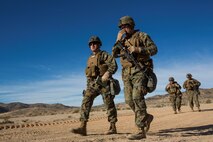 U.S. Marine Corps Lt. Col. Brian Greene, right, 2nd Battalion, 4th Marine Regiment commanding officer, briefs Col. Kenneth Kassner, left, the commanding officer of 5th Marine Regiment, during Steel Knight 16 at Marine Corps Air-Ground Combat Center, Twentynine Palms, Calif., Dec. 10, 2015. Steel Knight enables 1st Marine Division to test and refine its command and control capabilities by acting as the headquarters element for a forward-deployed Marine Expeditionary Force. (U.S. Marine Corps Combat Camera photograph by ( Lance Cpl. Roderick L. Jacquote)/RELEASED)