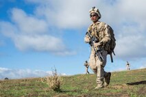 U.S. Marine Corps Lance Cpl. Christopher Tate, a fire team leader with Fox Company, 2nd Battalion, 7th Marine Regiment, 1st Marine Division patrols during a tactical recovery aircraft personnel exercise as a part of Steel Knight 16 at Fort Hunter Liggett, Calif., Dec. 11, 2015. Steel Knight is an annual field training exercise that enables 1st Marine Division to test and refine its command and control capabilities by acting as the headquarters element for a forward-deployed Marine Expeditionary Force. (U.S. Marine Corps Combat Camera photograph by ( Lance Cpl. Roderick L. Jacquote)/RELEASED)