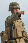 U.S. Marine Corps Capt. Jonathan Wallace, a fire direction officer with 2nd Battalion, 4th Marine Regiment, 1st Marine Division conducts a rehearsal of concept drill during Steel Knight 2016 at Marine Corps Air-Ground Combat Center, Twentynine Palms, Calif., Dec. 9, 2015. Steel Knight is an annual field training exercise that enables 1st Marine Division to test and refine its command and control capabilities by acting as the headquarters element for a forward-deployed Marine Expeditionary Force. (U.S. Marine Corps Combat Camera photograph by ( Lance Cpl. Roderick L. Jacquote)/RELEASED)