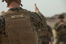 U.S. Marine Corps Lt. Col. Jonathan Bossie, 5th Marine Regiment operations officer, conducts a rehearsal of concept drill during Steel Knight 2016 at Marine Corps Air-Ground Combat Center, Twentynine Palms, Calif., Dec. 9, 2015. Steel Knight is an annual field training exercise that enables 1st Marine Division to test and refine its command and control capabilities by acting as the headquarters element for a forward-deployed Marine Expeditionary Force. (U.S. Marine Corps Combat Camera photograph by ( Lance Cpl. Roderick L. Jacquote)/RELEASED)