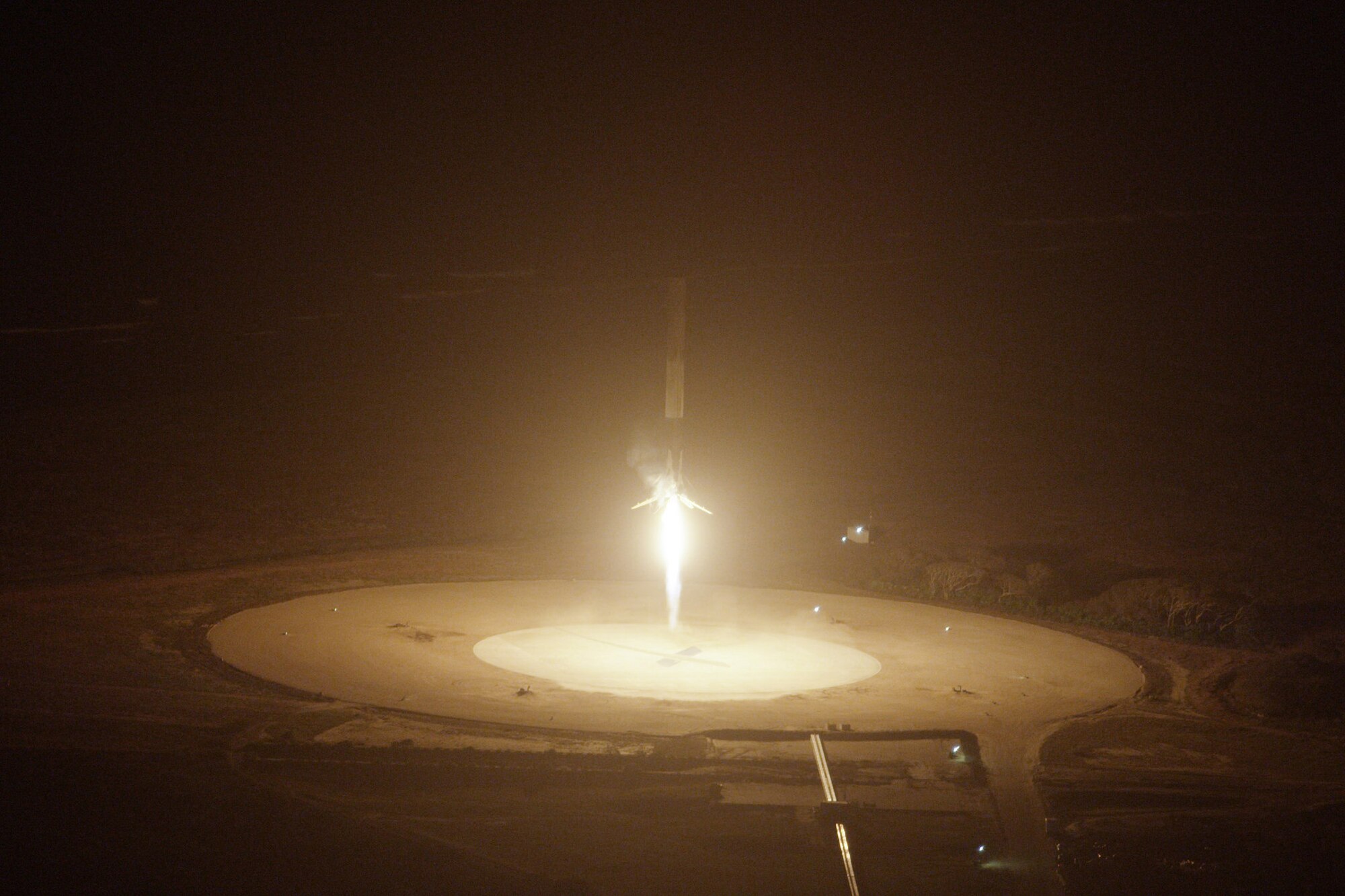 A SpaceX Falcon 9 rocket settles gently back to Earth at Landing Zone 1 (formerly Launch Complex 13) at Cape Canaveral Air Force Station less than 10 minutes after it took off from Launch Complex 40 a little more than 5 miles north. It marked the first time a rocket delivered satellites to orbit (11 on this particular mission), then returned to land safely. The reservists of the 920th Rescue Wing provide range clearance and safety contingency support for all rocket launches from CCAFS/Kennedy Space Center. (courtesy photo/SpaceX)