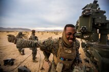 U.S. Marines Corporal Levin Jolley with India Battery, 3rd Battalion, 11th Marine Regiment, 1st Marine Division, sights in the M777 lightweight 155mm Howitzer at the new firing position during Steel Knight 2016 (SK-16) at Marine Corps Air Ground Combat Center Twentynine Palms, Calif., Dec 10, 2015. SK-16 is an annual military exercise developed to prepare 1st Marine Division personnel within the Ground Combat Element of a Marine Air-Ground Task Force. (U.S. Marine Corps photo by Lance Cpl Ryan Kierkegaard 1st Marine Division Combat Camera /Released)