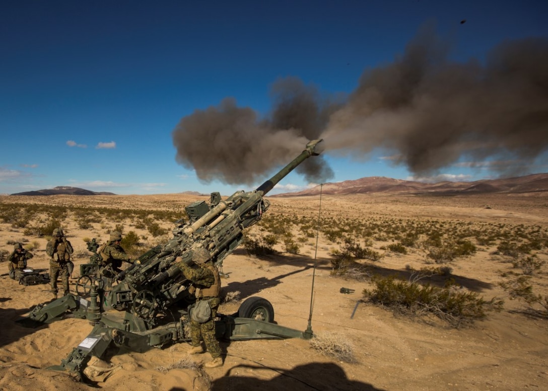 U.S. Marines with India Battery, 3rd Battalion, 11th Marine Regiment, 1st Marine Division, conduct a fire mission during Steel Knight 2016 (SK-16) at Marine Corps Air Ground Combat Center Twentynine Palms, Calif., Dec 11, 2015. SK-16 is an annual military exercise developed to prepare 1st Marine Division personnel within the Ground Combat Element of a Marine Air-Ground Task Force. (U.S. Marine Corps photo by Lance Cpl Ryan Kierkegaard 1st Marine Division Combat Camera /Released)