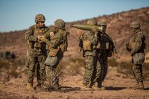 U.S. Marines with Mike Battery, 3rd Battalion, 11th Marine Regiment, 1st Marine Division, carry high explosive rounds during Steel Knight 2016 (SK-16) at Marine Corps Air Ground Combat Center Twentynine Palms, Calif., Dec 11, 2015. SK-16 is an annual military exercise developed to prepare 1st Marine Division personnel within the Ground Combat Element of a Marine Air-Ground Task Force. (U.S. Marine Corps photo by Lance Cpl Ryan Kierkegaard 1st Marine Division Combat Camera /Released)